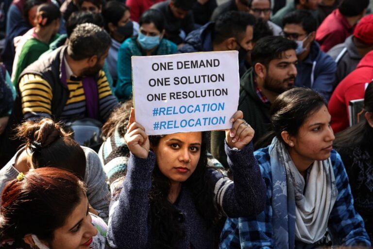 kashmiri pandit girl protesting.